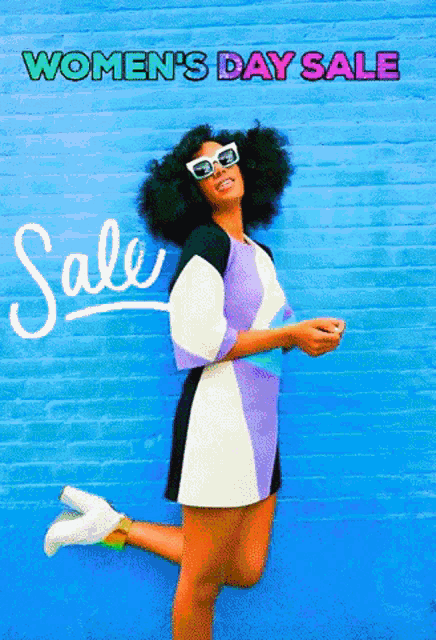 a woman standing in front of a blue wall with the words women 's day sale on it