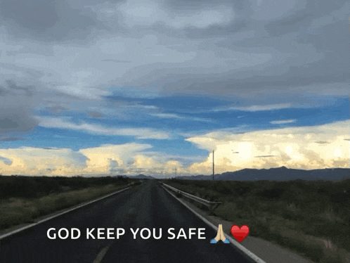 a picture of a road with the words god keep you safe on it