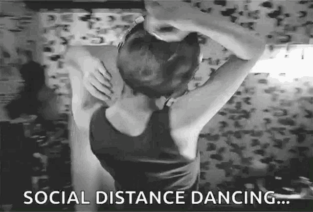 a black and white photo of a woman dancing with the words `` social distance dancing '' .