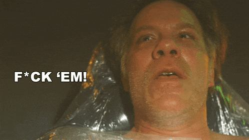 a man in a plastic bag with the words f * ck ' em ' on the bottom