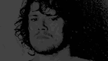 a black and white drawing of a man with curly hair