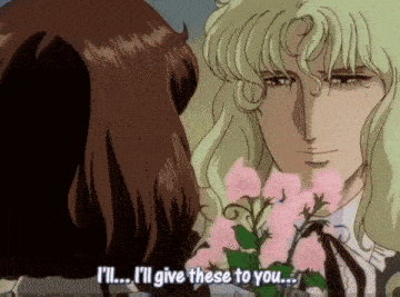 a man giving flowers to a woman with the words i 'll give these to you