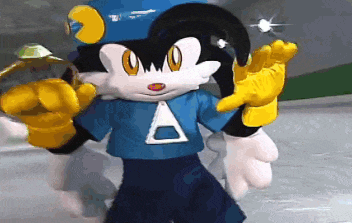 a cartoon character wearing a blue shirt with a triangle on it