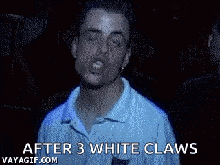 a man is singing in a dark room with the words after 3 white claws written on the bottom .