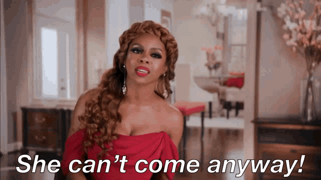 a woman in a red dress with the words she can 't come anyway