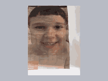 a picture of a boy 's face is behind a sign that says " what a waste "