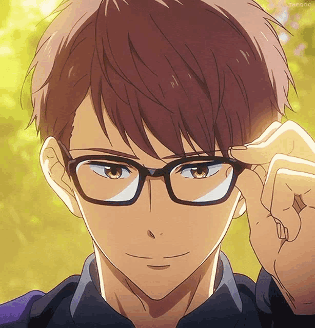 a close up of a person wearing glasses with the letters thegoo on the bottom right