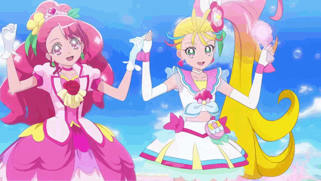 two anime girls are standing next to each other