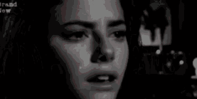 a black and white photo of a woman 's face with the word depression in red letters .