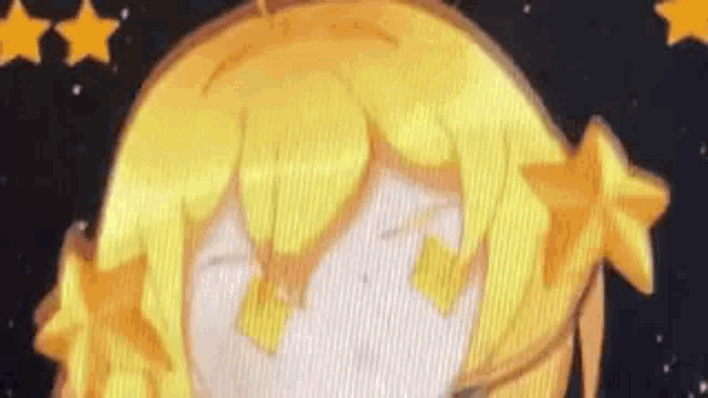a close up of a person 's face with yellow hair and stars in her hair .