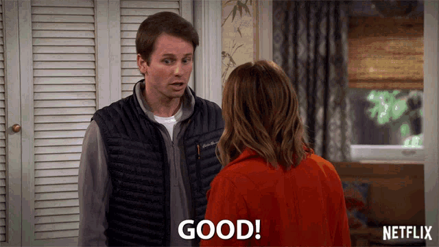 a man and a woman standing next to each other and the man says good