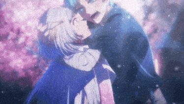 a man and a woman are hugging and kissing in the snow