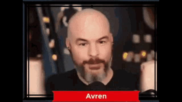 a bald man with a beard and the name avren
