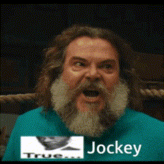 a man with a beard wearing a blue shirt that says jockey