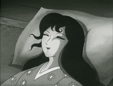 a black and white cartoon of a woman laying on a bed smiling