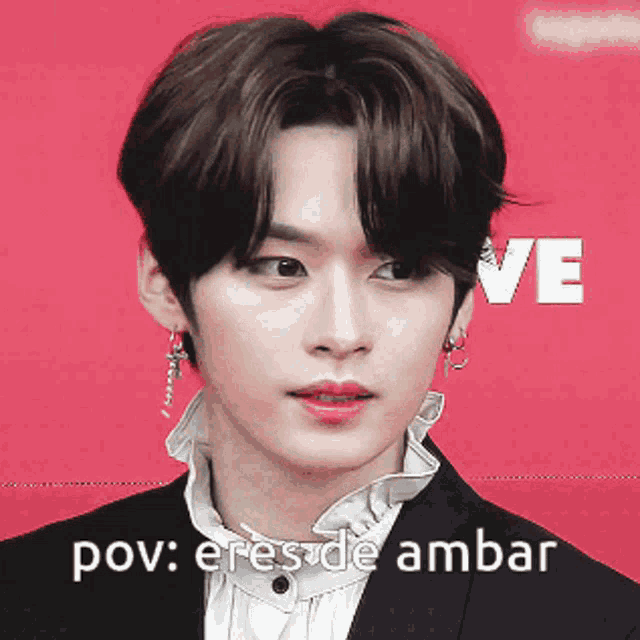 a close up of a man 's face with the words " pov : eres de ambar " written below him