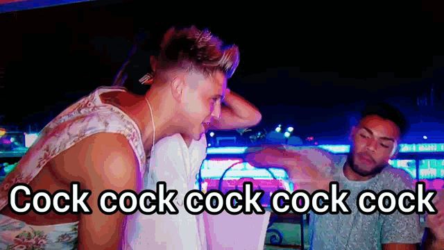 a group of men are standing in front of a sign that says cock cock cock cock cock cock cock