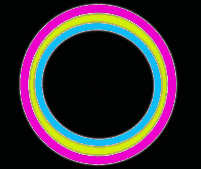 a pink yellow and blue circle with a black center on a black background