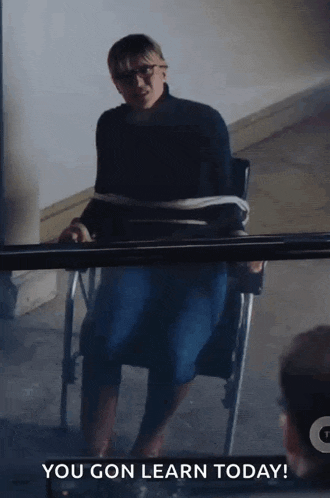 a woman in a wheelchair is tied up and says you gon learn today .