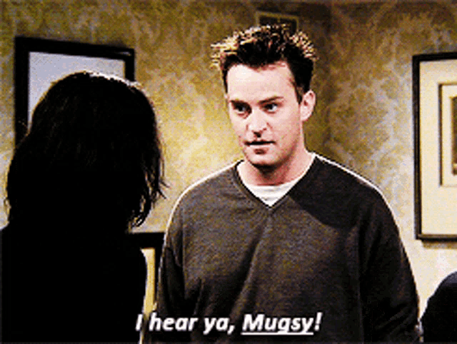 a man says i hear ya mugsy while standing next to a woman