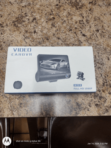 a box for a video car dvr with a picture of a car on the front