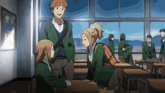 a group of people standing in a classroom talking