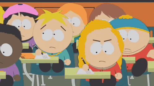 a group of south park characters are sitting at desks