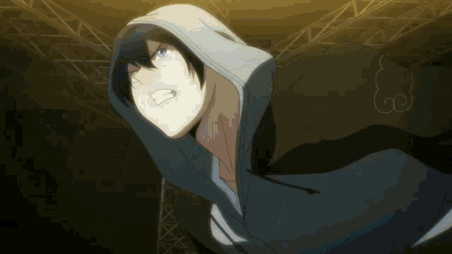 a man wearing a hooded sweatshirt looks angry