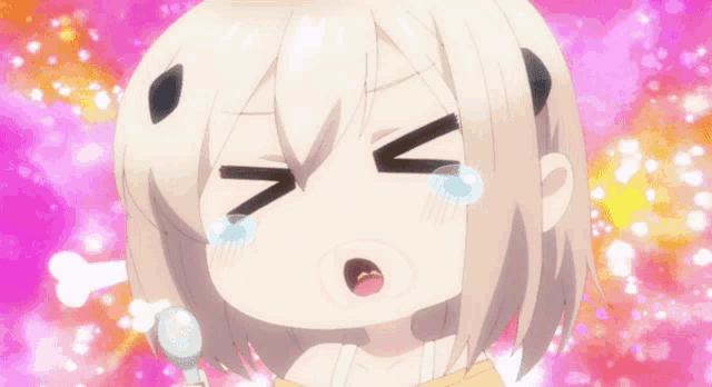 a girl with tears running down her face is holding a microphone