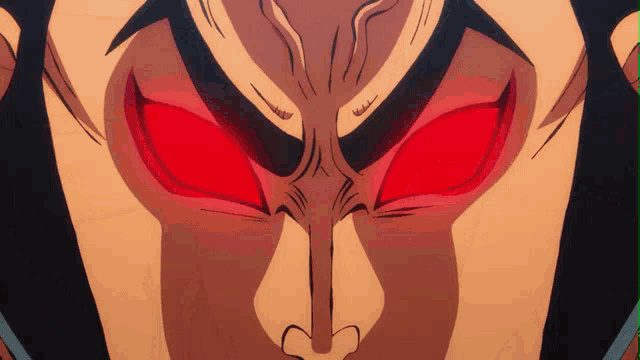 a close up of a face with red eyes
