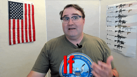 a man wearing a t-shirt that says if on it