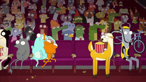 a bunch of cartoon characters are sitting in a theater