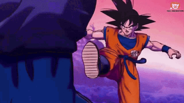 a cartoon of goku kicking a purple object with a purple background