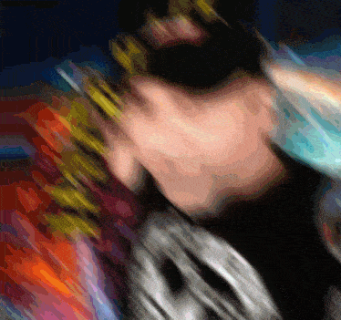 a blurry picture of a person with a crown on