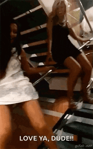 two women are dancing on a set of stairs with the words `` love ya , dude '' written on the bottom .