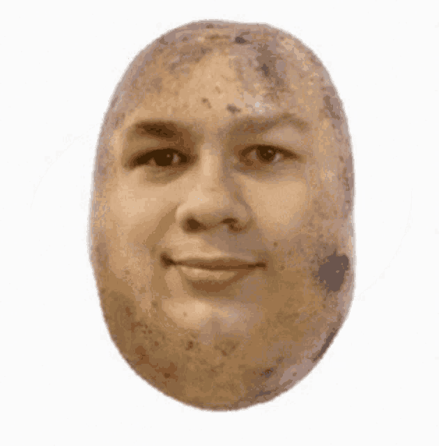 a potato that looks like a person 's face with a white background