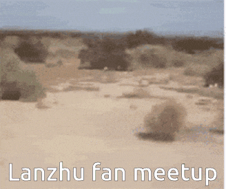 a blurred image of a desert with the words lanzhu fan meetup