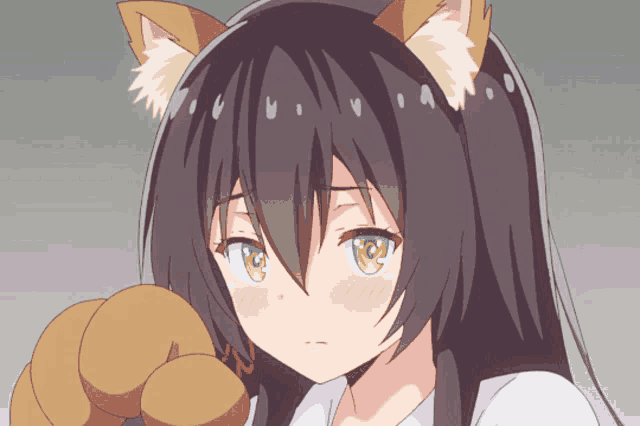 a close up of a girl with a cat ear on her head