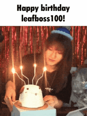 a woman lighting candles on a birthday cake with the words happy birthday leafboss 100