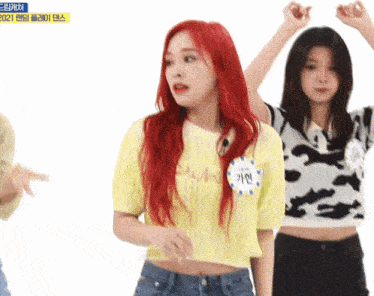 a girl with red hair has a name tag that says ' a ' on it