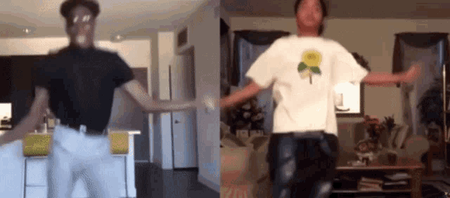 a man in a black shirt and a white shirt with a sunflower on it is dancing