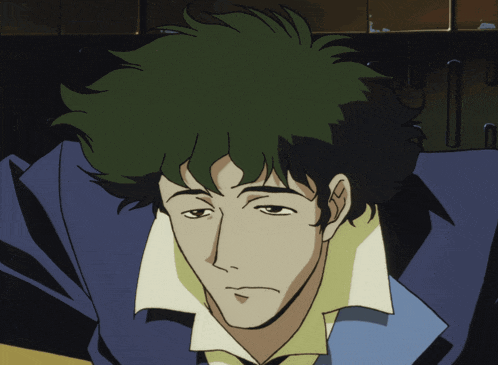 a close up of a man with green hair