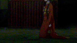 a woman in a red dress is kneeling in front of a red fence