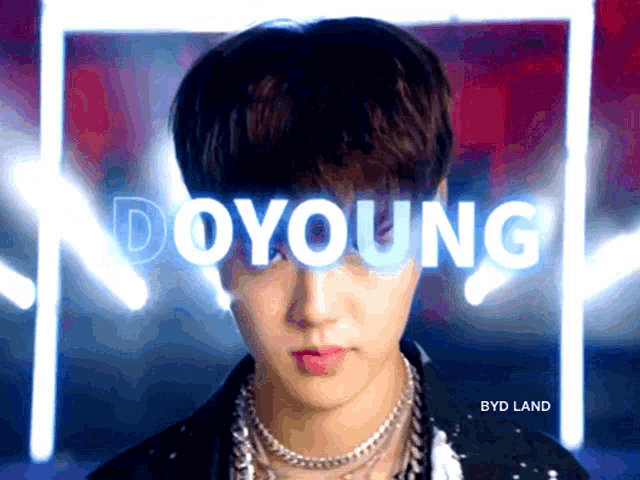 a young man with the name doyoung written above him