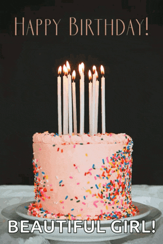 a birthday cake with candles and sprinkles with the words happy birthday beautiful girl below it