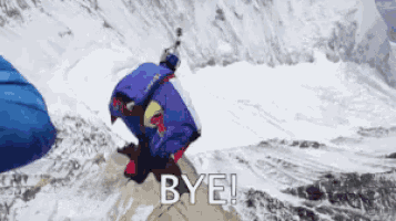 a man in a blue suit is flying through the air with the words bye below him
