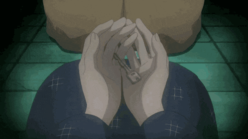 a person holding a key in their hands with the letter f on it