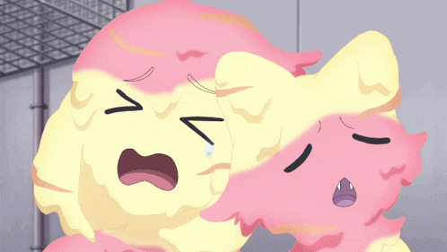 a pink and yellow cartoon character with a tear coming out of their eye