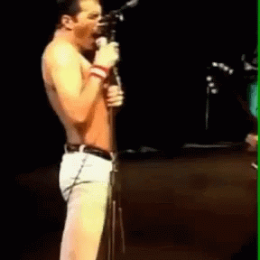 Freddie Mercury Yummy GIF - Freddie Mercury Yummy Live Performance GIFs