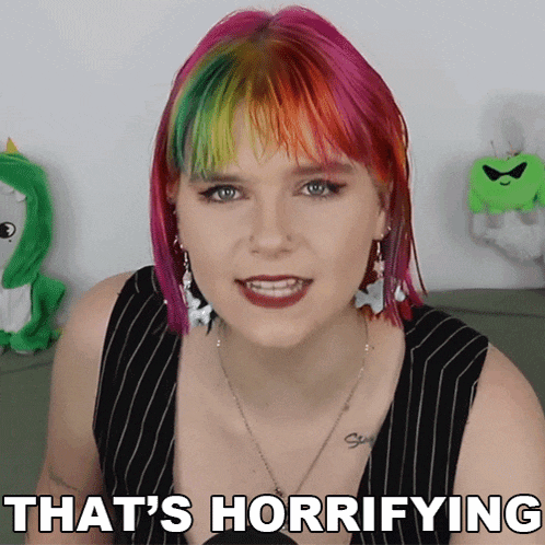a woman with rainbow hair is saying that 's horrificing